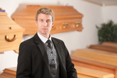 An undertaker with a display of coffins. An undertaker with a display of coffins.