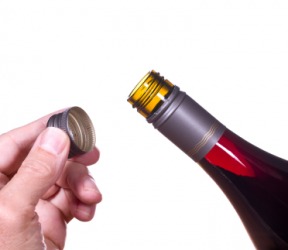 A man unscrewed this bottle. A man unscrewed this bottle.