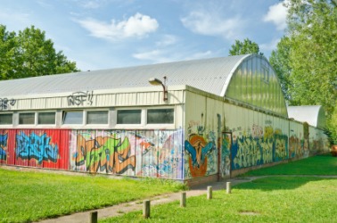 This school gym has been a victim of vandalism. This school gym has been a victim of vandalism.