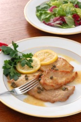 A plate of sauteed veal. A plate of sauteed veal.