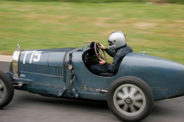 A vintage race car. A vintage race car.