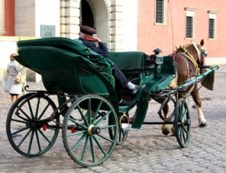 A wagoner naps in his wagon. A wagoner naps in his wagon.