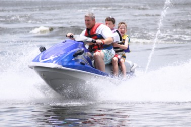 People enjoying a watersport. People enjoying a watersport.