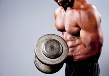 This man is a weightlifter. This man is a weightlifter.