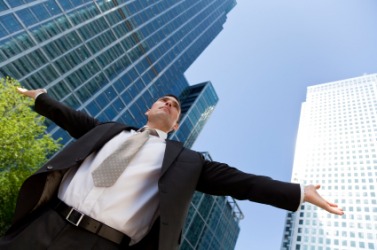 A man with his arms open wide. A man with his arms open wide.