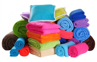A pile of various blankets. A pile of various blankets.