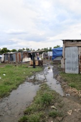 A village in an underdeveloped country. A village in an underdeveloped country.