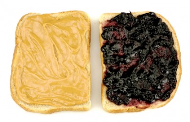 Jelly accompanies this peanunt butter. Jelly accompanies this peanunt butter.