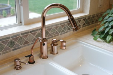 A kitchen faucet. A kitchen faucet.