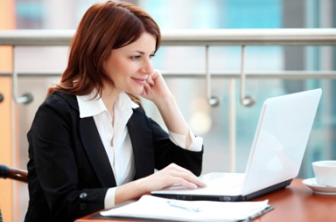 A woman using a pc. A woman using a pc.