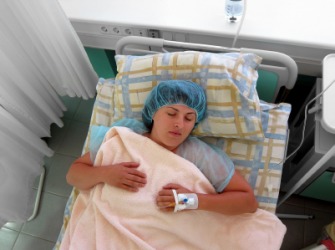 A woman immobile after surgery. A woman immobile after surgery.