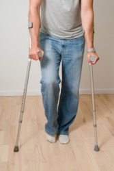 This mans injury causes him to limp. This mans injury causes him to limp.