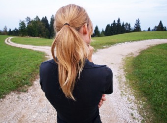 This woman is in a quandary as to which way to go. This woman is in a quandary as to which way to go.