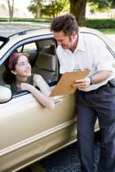A girl about to take her driving test. A girl about to take her driving test.