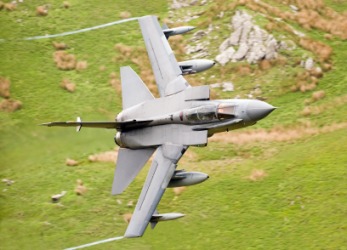 This military jet is an airplane. This military jet is an airplane.