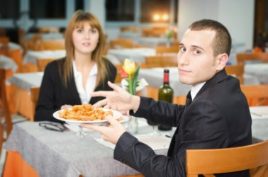 A man complains about his food. A man complains about his food.