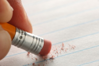 Using an eraser to delete a word. Using an eraser to delete a word.