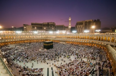 Pilgrims surround the Kaaba in the city of Mecca. Pilgrims surround the Kaaba in the city of Mecca.