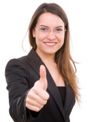 A woman gives the thumbs-up sign. A woman gives the thumbs-up sign.