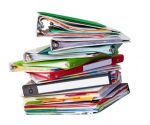 A stack of ring binders. A stack of ring binders.