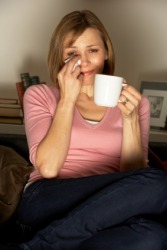 This woman is getting emtional over a television show. This woman is getting emtional over a television show.