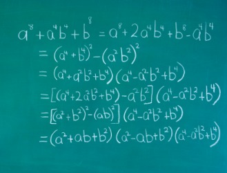 Examples of algebra on a chalkboard. Examples of algebra on a chalkboard.
