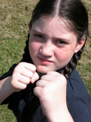 This little girl is ready to defend herself. This little girl is ready to defend herself.