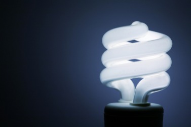 A compact fluorescent light bulb. A compact fluorescent light bulb.