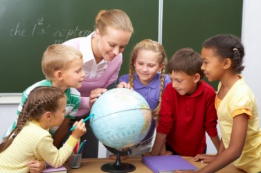 A group of students have a geography lesson. A group of students have a geography lesson.