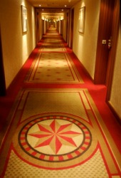 A hotel corridor. A hotel corridor.