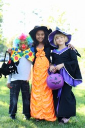 Children wearing Halloween costumes. Children wearing Halloween costumes.