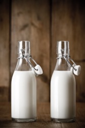 Two bottles of cows milk. Two bottles of cows milk.