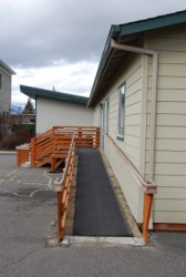 This wheelchair ramp is an adaptation to this house. This wheelchair ramp is an adaptation to this house.