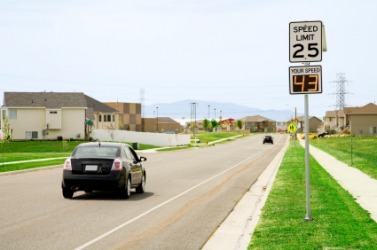 A sign shows this cars speed. A sign shows this cars speed.