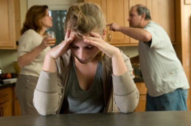 A girl is distressed by the conflict between her parents. A girl is distressed by the conflict between her parents.