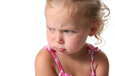 This little girl is not in a good mood. This little girl is not in a good mood.