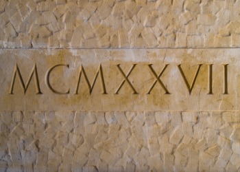 A Roman numeral is an example of something that is ideographic. A Roman numeral is an example of something that is ideographic.