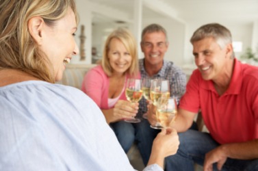 A group of people enjoy a glass of wine. A group of people enjoy a glass of wine.