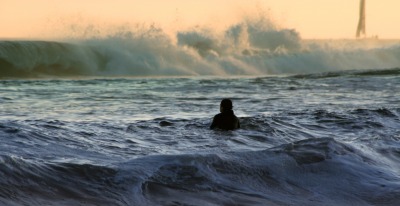 Precarious is swimming in a rough sea. Precarious is swimming in a rough sea.
