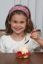 A little girl shows proper decorum. A little girl shows proper decorum.