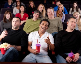 The movie they are watching seems to have a lot of appeal. The movie they are watching seems to have a lot of appeal.