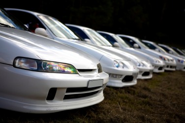 A succession of white cars. A succession of white cars.