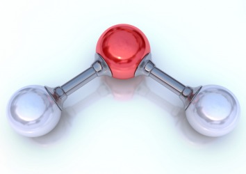 A model of a water molecule. A model of a water molecule.