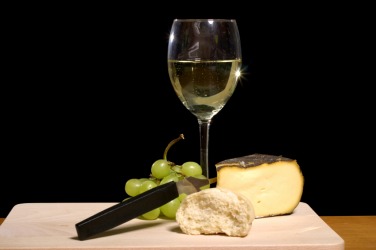 Wine is an appropriate pairing with cheese. Wine is an appropriate pairing with cheese.