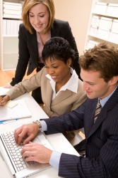A manager oversees her employees. A manager oversees her employees.