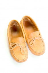 A pair of leather moccasins. A pair of leather moccasins.