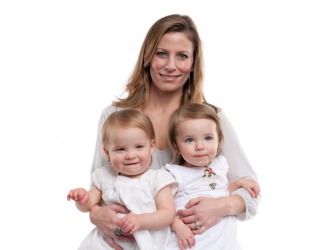 Twin girls with their mother. Twin girls with their mother.