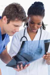A PA (physician assistant) at work. A PA (physician assistant) at work.