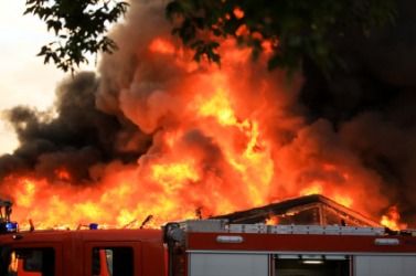 The blaze of a housefire. The blaze of a housefire.