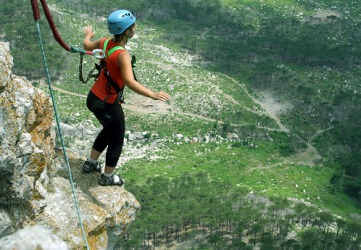 The woman did not want to think about how her life might be in peril when she decided to bungee jump off of a cliff. The woman did not want to think about how her life might be in peril when she decided to bungee jump off of a cliff.